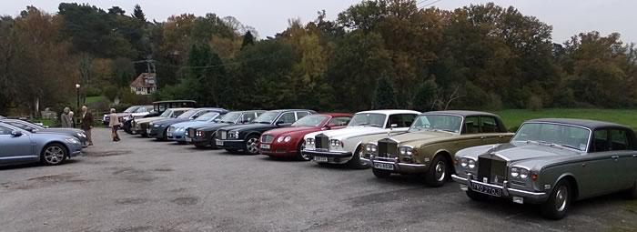 Line up of memberes' motor cars